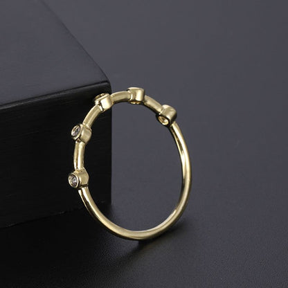 Gold Ring Zirconium Diamond Wedding Style Minimalist TailElevate your style with our Gold Ring Zirconium Diamond. Crafted with quality copper and electroplated with 14K gold, this European and American style ring features EaringsPlush Fashions ShopPlush Fashion Shop