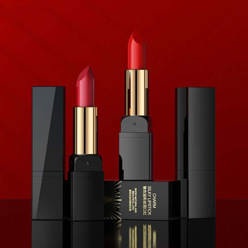 Plush Fashions Gentle Moisturizing Lipstick with vibrant red shades and sleek black packaging.