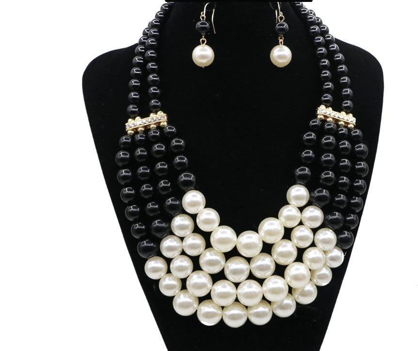 Multi Simulated Pearl Bohemian Jewelry SetAdd some bohemian flair to your jewelry collection with our Multi Simulated Pearl Bohemian Jewelry Set! Made with high-quality alloy and mother-of-pearl, this set feNecklacePlush Fashions ShopPlush Fashion Shop