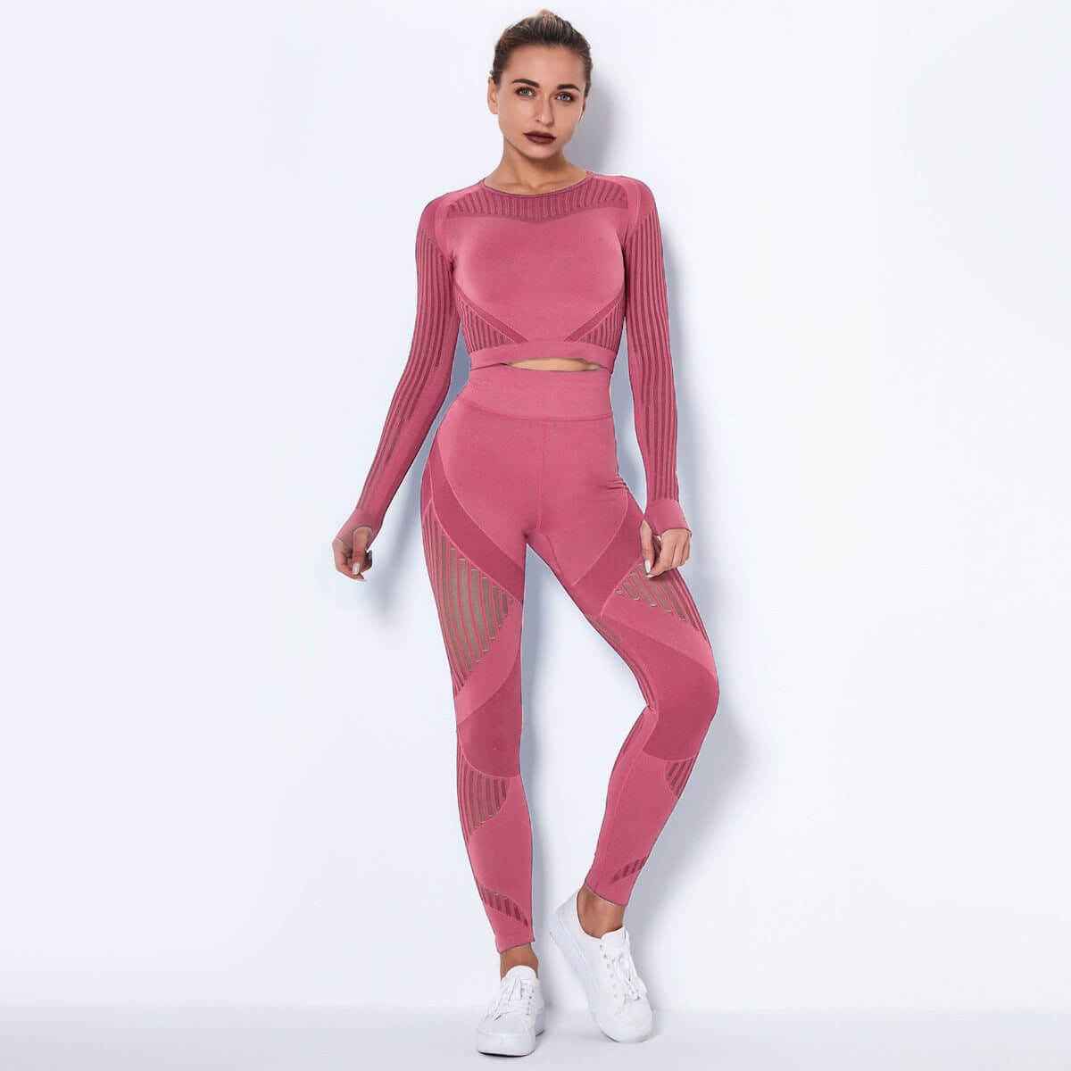 Seamless Knitted Absorbent Yoga Long-Sleeved Suit with stripe pattern in pink, offering flexibility and moisture-wicking properties.