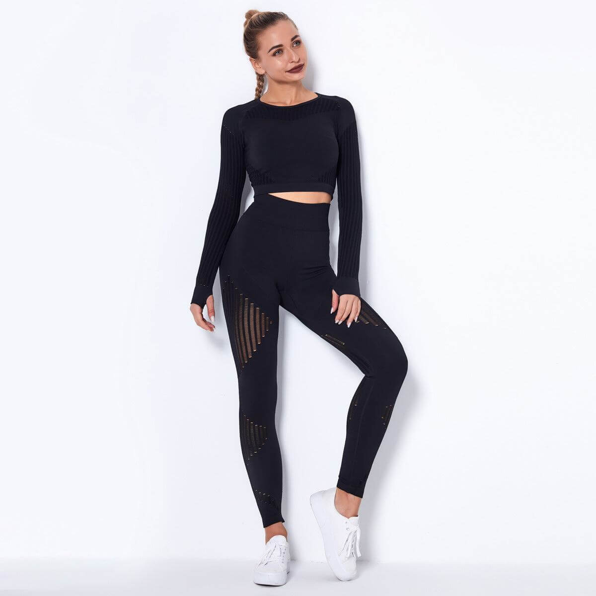 Seamless Knitted Absorbent Yoga Long-Sleeved Suit in black with striped pattern, featuring breathable, moisture-wicking fabric for flexibility.