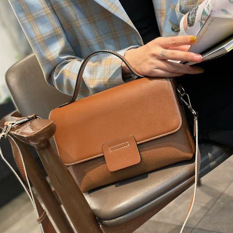 Leather Handbags New Style Single-shoulder Messenger BagThis leather handbag is a must-have for any fashion-forward individual. Made with high-quality leather, it exudes a retro vibe with its belt decoration and car stitcHandbagsPlush Fashions ShopPlush Fashion Shop