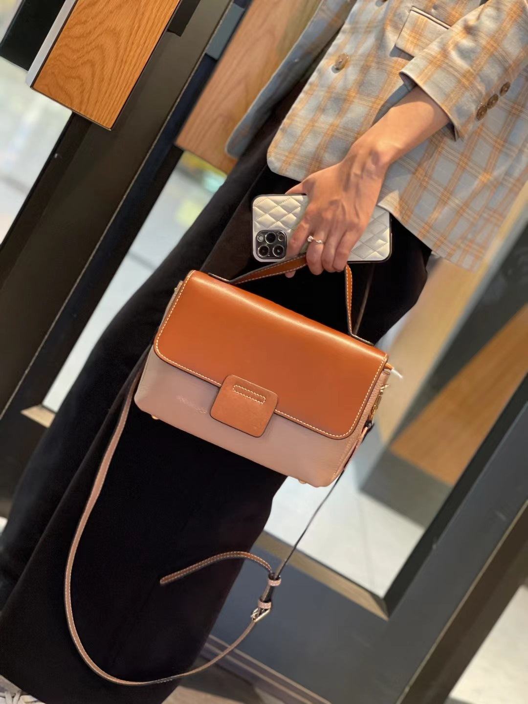 Leather Handbags New Style Single-shoulder Messenger BagThis leather handbag is a must-have for any fashion-forward individual. Made with high-quality leather, it exudes a retro vibe with its belt decoration and car stitcHandbagsPlush Fashions ShopPlush Fashion Shop