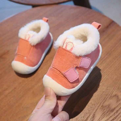 Toddler shoes in coral color with velvet and cotton material, featuring a non-slip sole and warm lining.