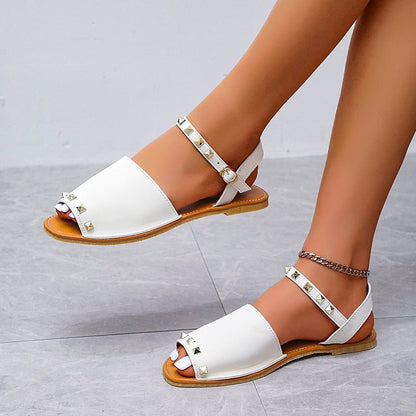 Rivet Sandals Summer Fish Mouth Shoes For Women Flat Beach ShoesElevate your summer shoe game with our Rivet Sandals! These Roman style sandals feature a comfortable fish mouth toe shape and a shallow mouth design. The frosted prSandalsPlush Fashions ShopPlush Fashion Shop