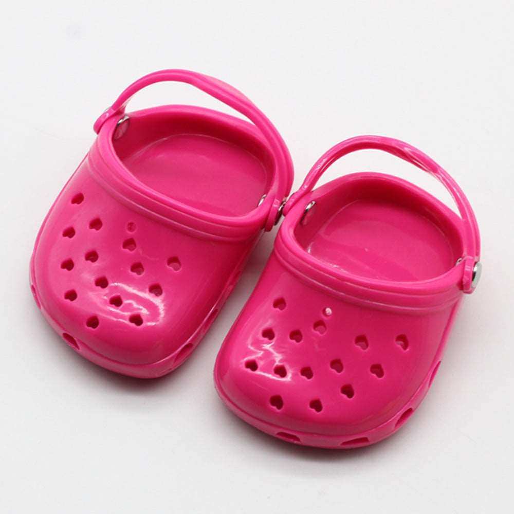 Pink children doll beach slippers for beach fun and play.