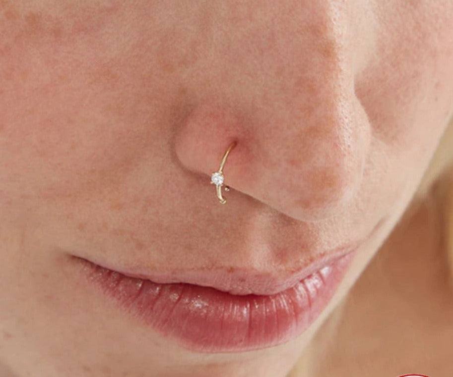 Sterling Silver Diamond Body Piercing Jewelry Nose RingEnhance your style and make a statement with our Sterling Silver Diamond Body Piercing Jewelry Nose Ring! Made with eco-friendly electroplating, this geometric shapeNose RingPlush Fashions ShopPlush Fashion Shop