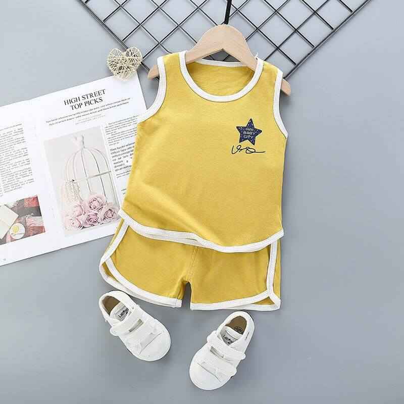 Pure cotton boys and girls suit, sleeveless yellow top and shorts, ideal for summer wear, displayed with white sandals.