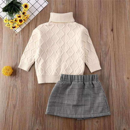 Turtleneck sweater + plaid skirt suitThis elegant suit features a turtleneck sweater and plaid skirt, perfect for any occasion. Long sleeves provide warmth, while the cotton fabric guarantees comfort. WGirls 2 piece setPlush Fashions ShopPlush Fashion ShopTurtleneck sweater + plaid skirt suit