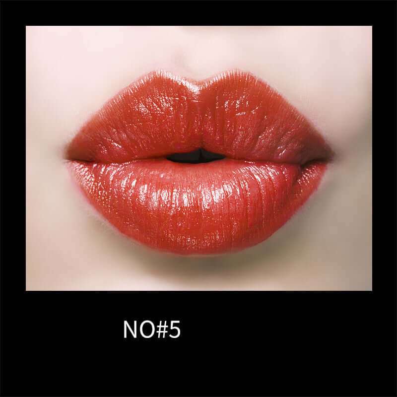 Close-up of lips wearing Plush Fashions Gentle Moisturizing Lipstick in vibrant shade, labeled No. 5.