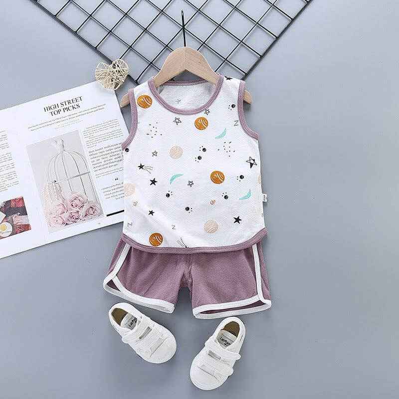 Pure cotton boys and girls sleeveless suit with animal cartoons, shorts, and shoes on display.