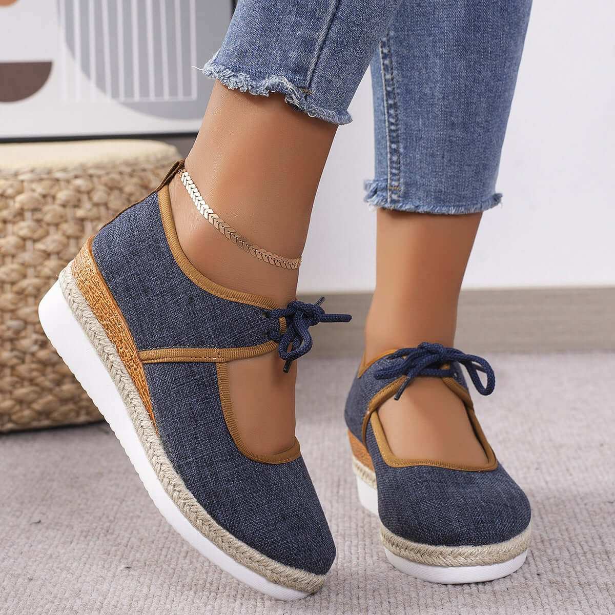 Tied Cutout Wedge Slip-Ons in blue, mid heel shoes, worn by person in jeans.