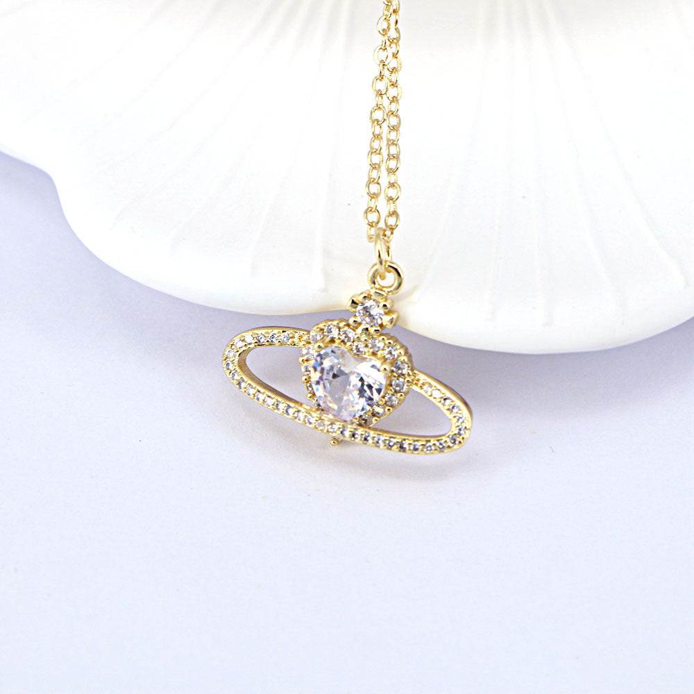 Ladies fashion personality zircon love necklace in metal with heart-shaped pendant.