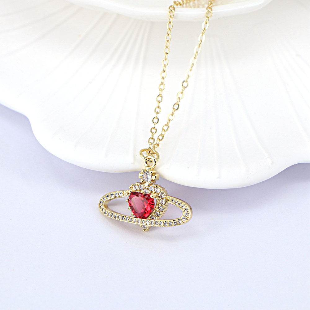 Ladies fashion zircon love necklace with red heart pendant and gold chain.