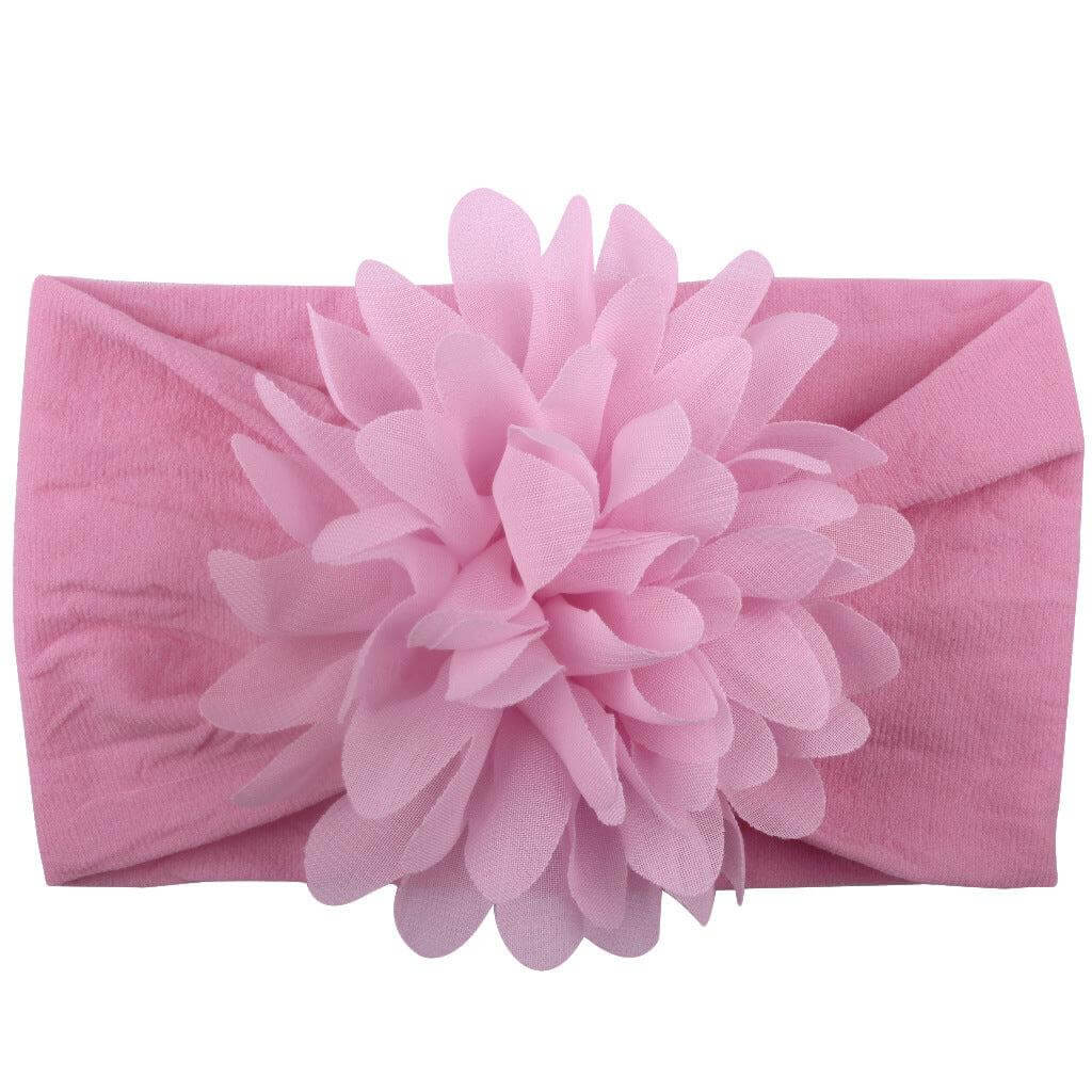 Pink chiffon flower baby headband hair accessory.