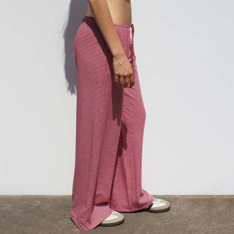 Women's Striped Fashion Casual  Home  Wide-leg PantsElevate your wardrobe with our Women's Striped Print Trousers! Made from high-quality polyester fiber, enjoy a comfortable and stretchy fit with a low waist design. PantsPlush Fashions ShopPlush Fashion Shop