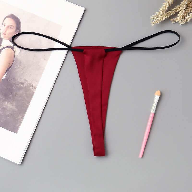 Women's Minimalist Low Waisted Underwear With One RopeExperience comfort and style with our Women's Minimalist Low Waisted Underwear! Made with a polyester cotton blend, our solid color underwear features a low waist deunderwearPlush Fashions ShopPlush Fashion Shop