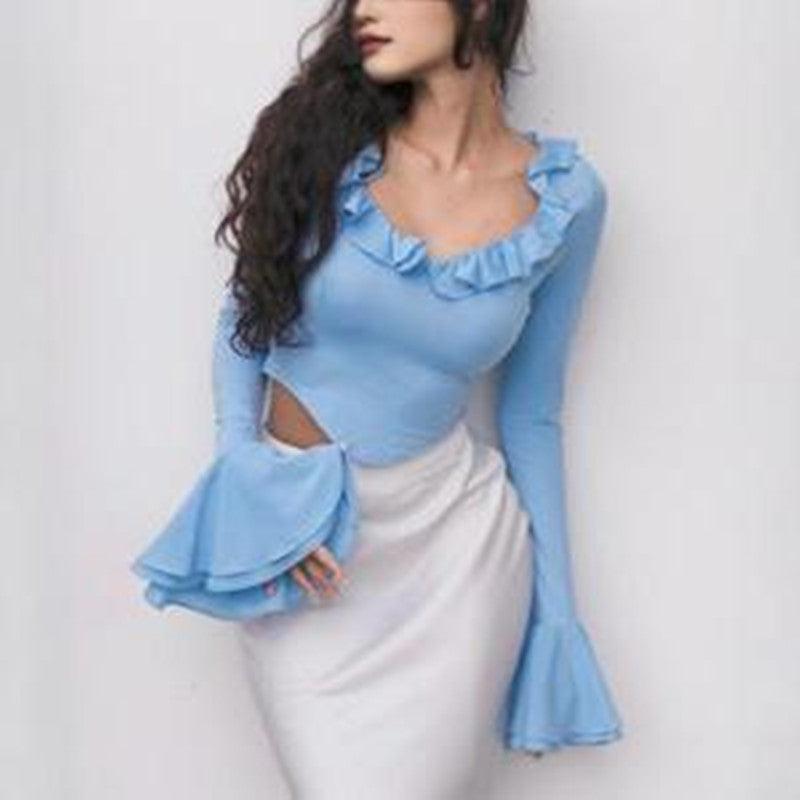 Fashion Women's Wear Ruffled Flared Sleeve TopElevate your wardrobe with our Fashion Women's Wear Ruffled Flared Sleeve Top! Made from soft and durable polyester, this top comes in a beautiful blue color and a sShirtPlush Fashions ShopPlush Fashion Shop