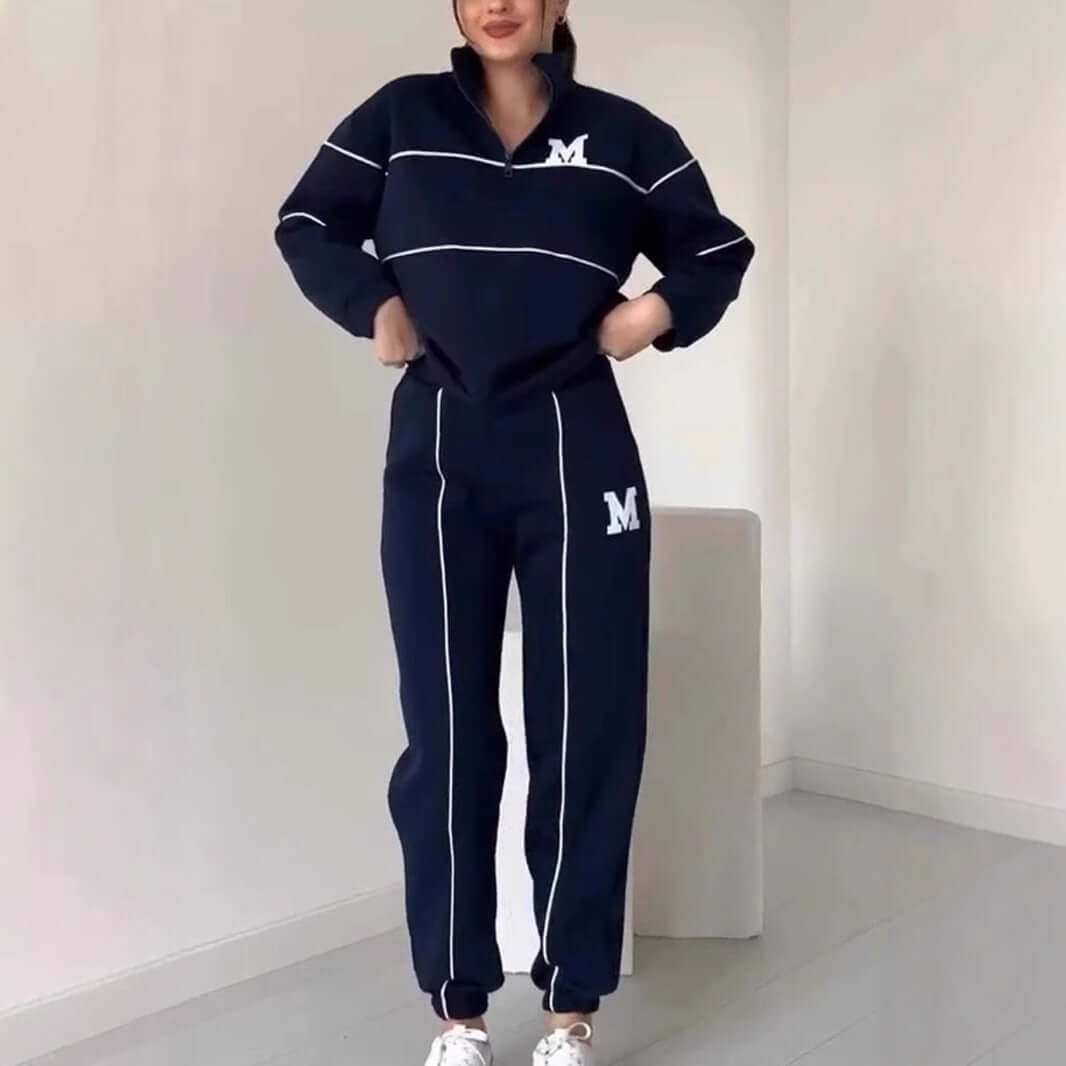 Women's fashion pullover sweatsuit set with stylish stripes, hoodless design, and pockets.