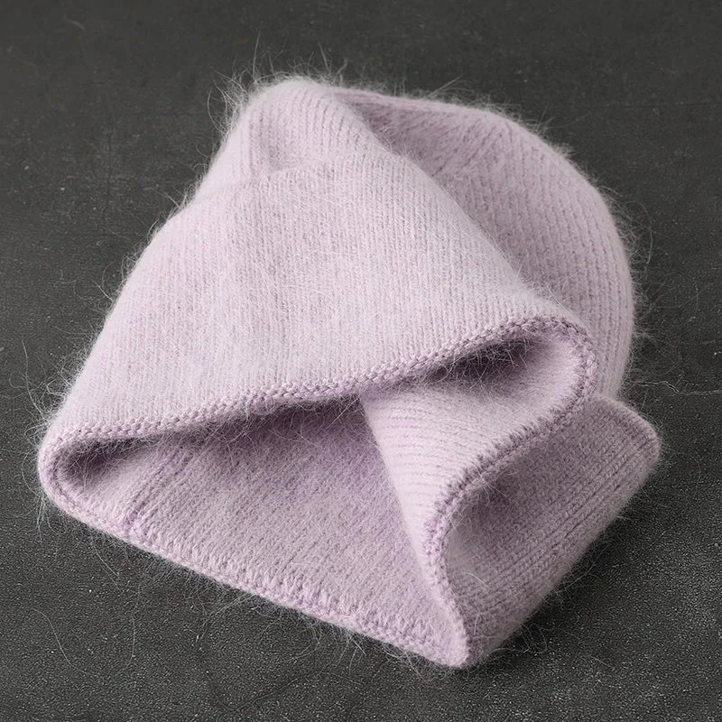 Women solid color fur knitted bonnet in light purple, warm ski beanie.