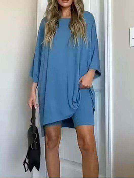 Women's solid color loose T-shirt and shorts set in blue.