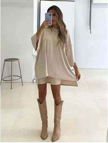 Women's fashion solid color loose T-shirt and tight shorts set.