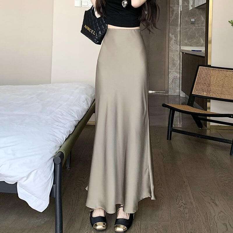 Fashion Skirt Women's Mid-length High Waist SheathEmbrace elegance and style with our Fashion Skirt! Made with high quality polyester, this mid-length high waist sheath skirt comes in champagne, brown, and black. ItSkirtPlush Fashions ShopPlush Fashion Shop