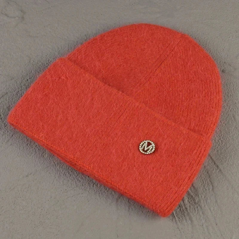 Women solid color fur knitted bonnet in red, cozy and stylish warm ski sullies beanie.