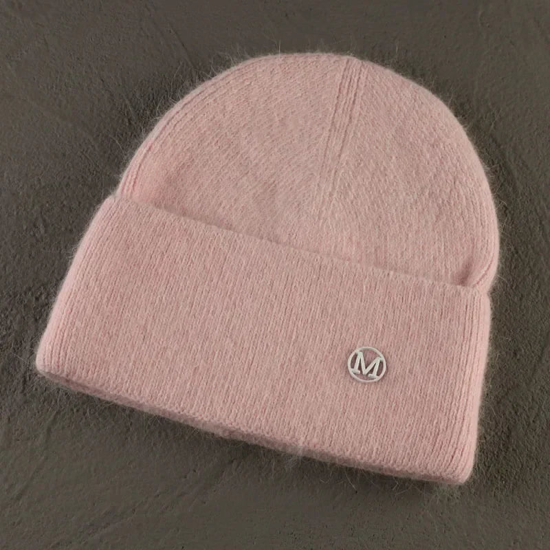 Women solid color fur knitted bonnet in pink, warm ski sullies beanie.