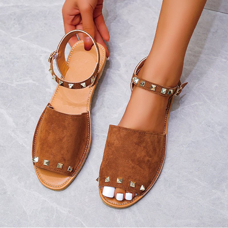 Rivet Sandals Summer Fish Mouth Shoes For Women Flat Beach ShoesElevate your summer shoe game with our Rivet Sandals! These Roman style sandals feature a comfortable fish mouth toe shape and a shallow mouth design. The frosted prSandalsPlush Fashions ShopPlush Fashion Shop