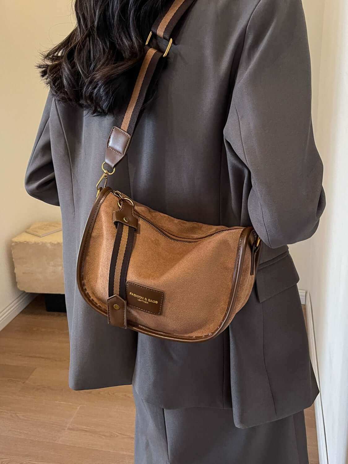 Suede Adjustable Strap Women's Shoulder Bag in brown, worn over shoulder, stylish and spacious.