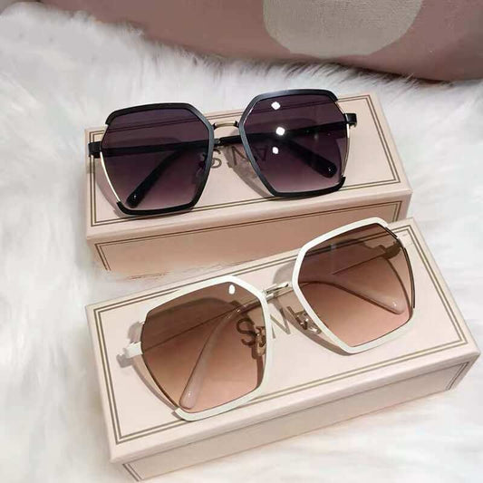 Vintage Half-Frame SunglassesExperience the vintage charm and style of our Half-Frame Sunglasses! Made with high-quality metal, these shades provide both sun protection and a touch of elegance. SunglassesPlush Fashions ShopPlush Fashion Shop