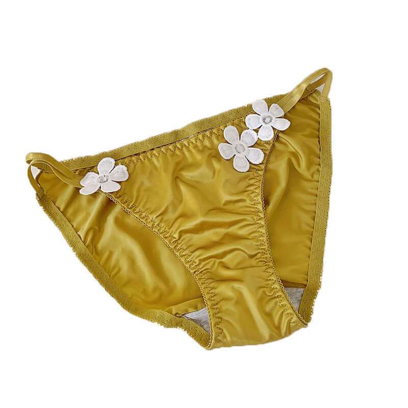 Silky embroidered floral decorations low waist briefs in yellow.