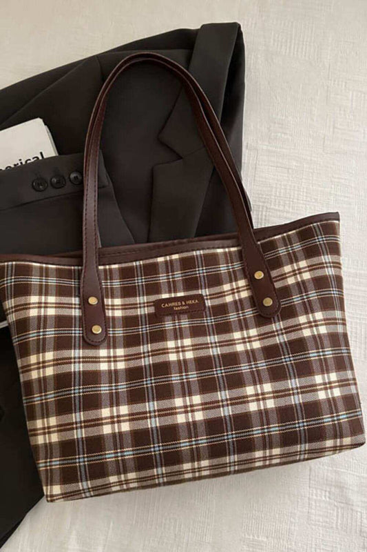 Plaid leather tote bag for women with brown and beige checkered design.