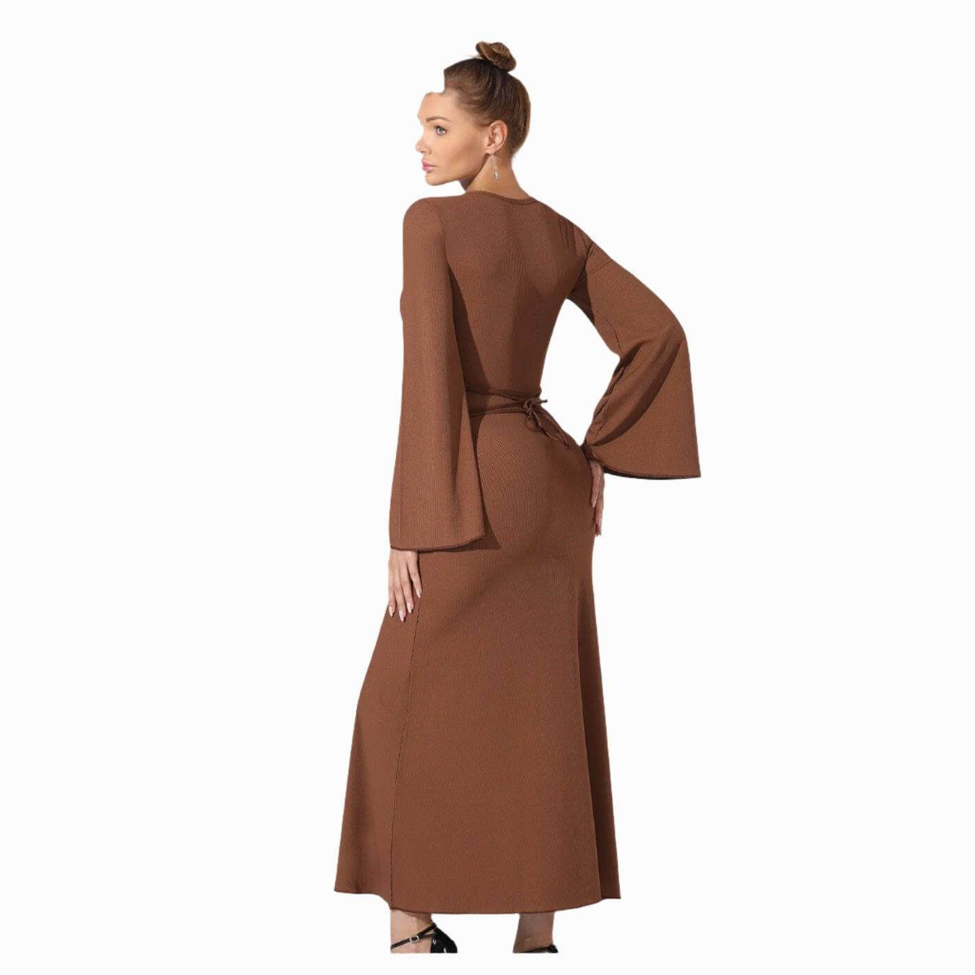 Women's fashion simple solid color dress in brown, full-length with long sleeves, worn by a model.