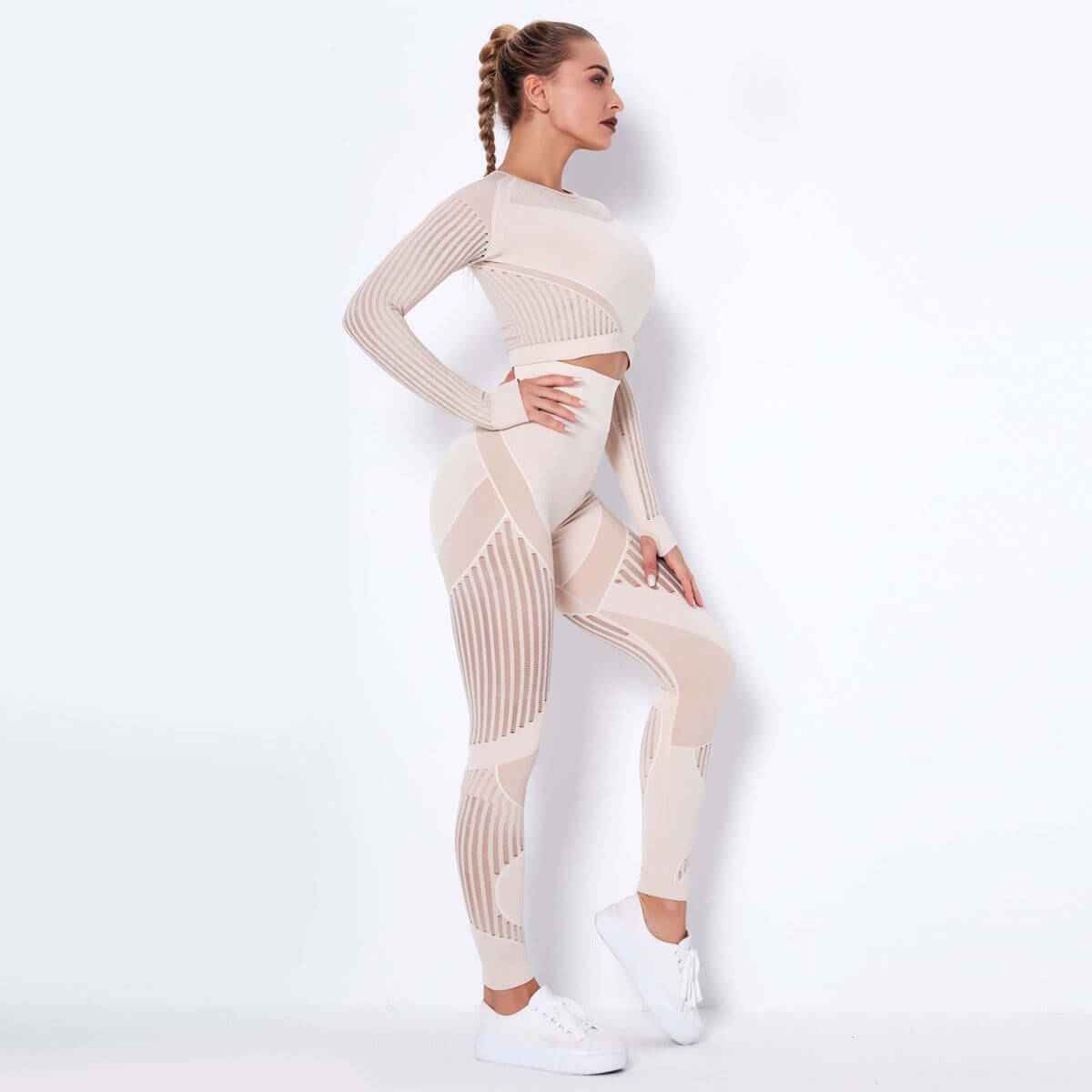 Seamless knitted absorbent yoga long-sleeved suit with stripe pattern and sleek Lycra lining.