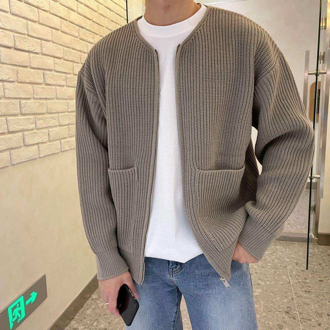 Knitted lined funnel neck men's zip-up cardigan sweater in gray.