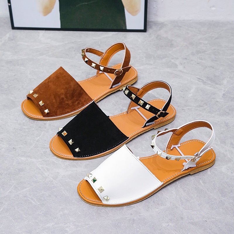 Rivet Sandals Summer Fish Mouth Shoes For Women Flat Beach ShoesElevate your summer shoe game with our Rivet Sandals! These Roman style sandals feature a comfortable fish mouth toe shape and a shallow mouth design. The frosted prSandalsPlush Fashions ShopPlush Fashion Shop