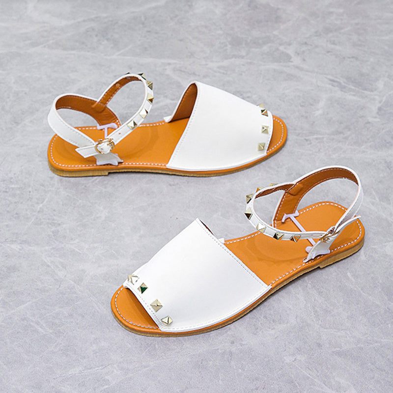 Rivet Sandals Summer Fish Mouth Shoes For Women Flat Beach ShoesElevate your summer shoe game with our Rivet Sandals! These Roman style sandals feature a comfortable fish mouth toe shape and a shallow mouth design. The frosted prSandalsPlush Fashions ShopPlush Fashion Shop