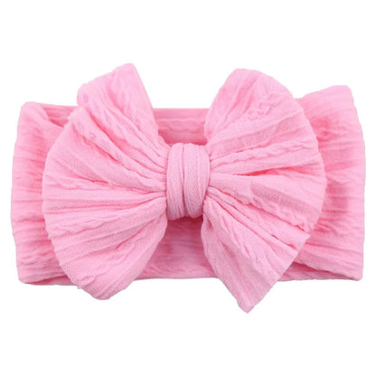 Newborn Solid Cable Baby Bow Headband for ChildEnhance any outfit with our Solid Cable Bow Baby Headband! Stretchy, soft Nylon material won't hurt your baby's head and will grow with them. Available in 20 colors,HairbowsPlush Fashions ShopPlush Fashion ShopNewborn Solid Cable Baby Bow Headband